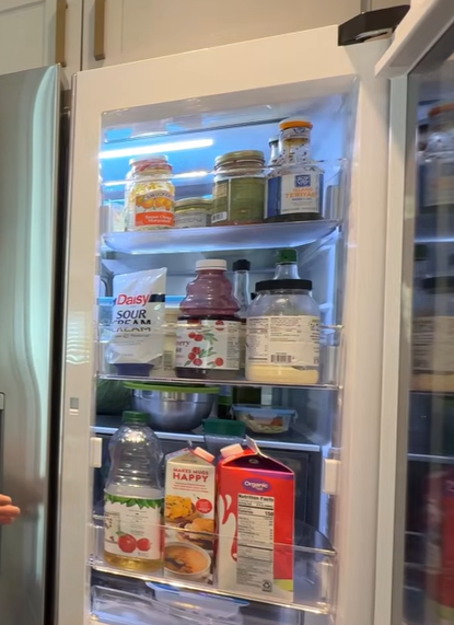 LG LRYKC2606S open Door-in-Door compartment with drinks and condiments